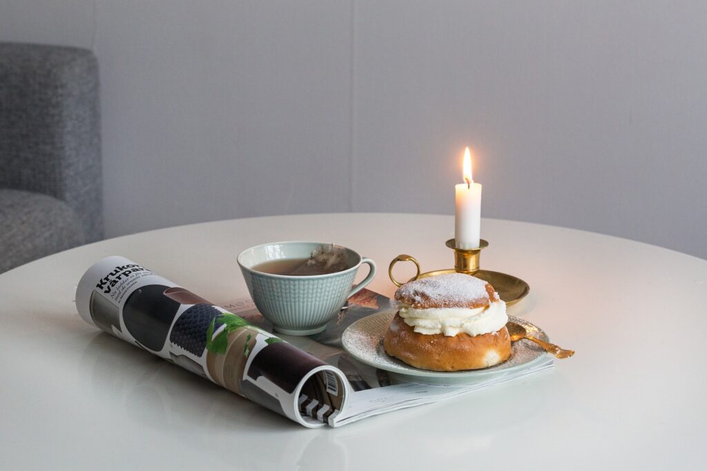 Swedish Semla on a Table with a Candle